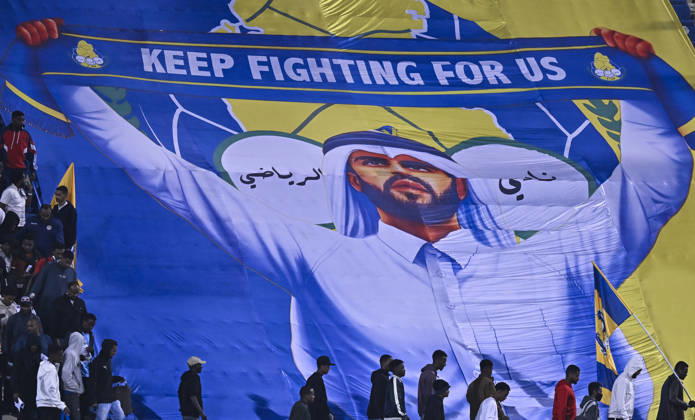 AFC CHAMPIONS LEAGUE ELITE, AL GHARAFA SC V AL WAHDA FC Fans of Al Gharafa SC cheer during the AFC Champions League elite west football match between Qatar s Al Gharafa SC and United Arab Emirates Al Wahda FC at Thani Bin Jassim Stadium in Doha, Qatar on December 22, 2025. DOHA Qatar Copyright: xNOUSHADxTHEKKAYILx