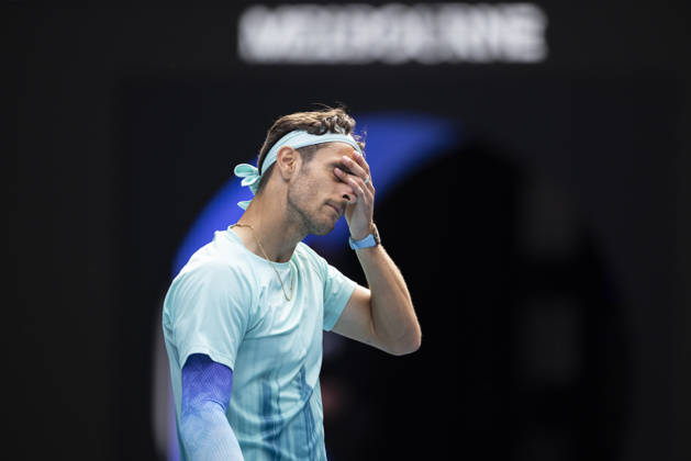 (260128) -- MELBOURNE, Jan. 28, 2026 -- Lorenzo Musetti of Italy reacts during the men s singles quarterfinal match between Novak Djokovic of Serbia and Lorenzo Musetti of Italy at the Australian Open tennis tournament in Melbourne, Australia, Jan. 28, 2026. (Photo by Xinhua) (SP)AUSTRALIA-MELBOURNE-TENNIS-AUSTRALIAN OPEN-MEN S SINGLES-QUARTERFINALS HuxJingchen 