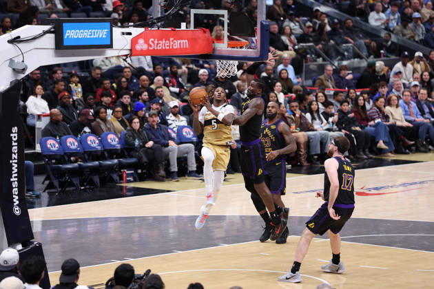 January 30, 2026, Washington, District Of Columbia, USA: JAMIR WATKINS 5 of the Washington Wizards drives to the basket as DEANDRE AYTON 5 of the Los Angeles Lakers plays defense during the game at Capital One Arena Washington USA - ZUMAs352 20260130_zsp_s352_021 Copyright: xSabinaxShyshx