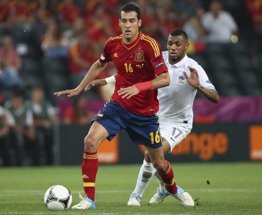 Spain V France, UEFA EURO, EM, Europameisterschaft,Fussball 2012 Quarter Final Sergio Busquets of Spain and Yann M Vila of France challenge during the UEFA Euro 2012 Quarter Final match between Spain and France at Donbass Arena on June 23, 2012 in Donetsk, Ukraine. Donetsk Donbass Arena Ukraine Ukraine Copyright: xAllstarxPicturexLibraryxLtdx
