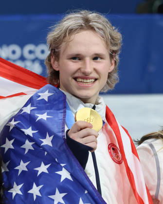 February 8, 2026, Milan, Lombardy, Italy: ILIA MALININ of Team USA celebrates winning the gold medal during the Victory Ceremony of the Figure skating, Eiskunstlauf Team Event at the Milano Cortina 2026 Winter Olympic Games, Olympische Spiele, Olympia, OS Milan Italy - ZUMAc179 20260208_oly_c179_104 Copyright: xMickaelxChavetx