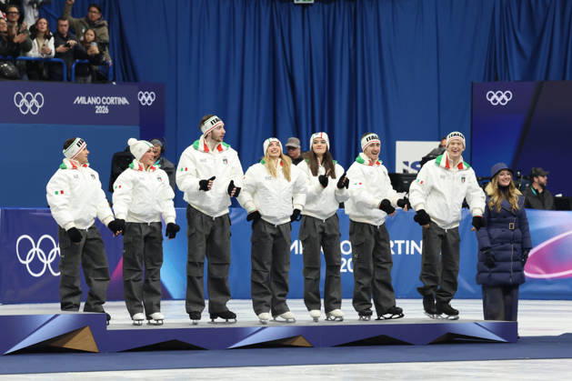 February 8, 2026, Milan, Lombardy, Italy: MARCO FABBRI, CHARLENE GUIGNARD, NICCOLO MACII, SARA CONTI, LARA NAKI GUTMANN, MATTEO RIZZO and DANIEL GRASSL of Team Italy celebrate winning the silver medal during the Victory Ceremony of the Figure skating, Eiskunstlauf Team Event at the Milano Cortina 2026 Winter Olympic Games, Olympische Spiele, Olympia, OS Olympics 2026: Milano Cortina: Figure Skating Team Event - ZUMAc179 20260208_oly_c179_153 Copyright: xMickaelxChavetx