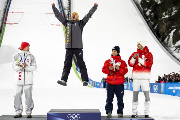 Ski jumping, Skispringen, Ski, nordisch - Milano Cortina 2026 Winter Olympics Day 3 (From L) Silver medallist Poland s Kacper Tomasiak, gold medallist Germany s Philipp Raimund and Bronze medallists who tied for third place Japan s Ren Nikaido and Switzerland s Gregor Deschwanden celebrate on the podium for the men s ski jumping normal hill individual final round of the Milano Cortina 2026 Winter Olympic Games, Olympische Spiele, Olympia, OS at Predazzo Ski Jumping Stadium in Predazzo (Val di Fiemme), on February 9, 2026. Predazzo Italy  Copyright: xAndrzejxIwanczukx originalFilename:iwanczuk-skijumpi260210_npcAb.jpg