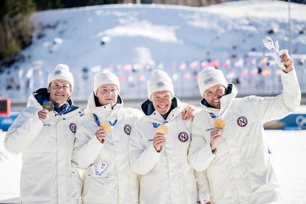 260215 Emil Iversen, Martin Lowstrom Nyenget, Einar Hedegart and Johannes Hosflot Klaebo of Norway celebrate on the podium after the men s 4 x 7.5km relay cross-country skiing race during day 9 of the 2026 Winter Olympics on February 15, 2026 in Val di Fiemme. Photo: Maxim Thore BILDBYRAN kod MT MT0983 skidor cross-country skiing langrenn Olympic Games, Olympische Spiele, Olympia, OS olympics winter olympics os ol olympiska spel vinter-os olympiske leker milano cortina 2026 milan cortina 2026 milano cortina 2026 olympic games milano cortina 2026 winter olympic games milano cortina-os milano cortina-ol vinter-ol 9 bbeng herr stafett norge jubel Copyright: MAXIMxTHORE BB260215MT094