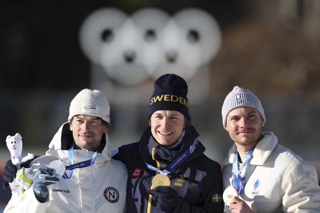 (260215) -- ANTERSELVA, Feb. 15, 2026 -- Gold medalist Martin Ponsiluoma (C) of Sweden, silver medalist Sturla Holm Laegreid (L) of Norway and bronze medalist Emilien Jacquelin of France pose for photos during the awarding ceremony of the biathlon men s 12.5km pursuit at the 2026 Milan-Cortina Winter Olympics in Anterselva, Italy, Feb. 15, 2026. ) (MICO2026)ITALY-ANTERSELVA-OLYMPIC Winter games, Winterspiele,Spiele, Summer games BIATHLON-MEN S 12.5KM PURSUIT ZhangxTao 