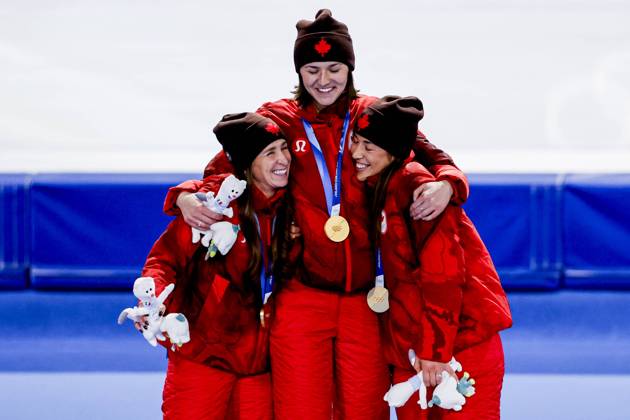 winner team of Canada, Ivanie Blondin of Canada and Valerie Maltais of Canada and Isabelle Weidemann of Canada smiling during the medal ceremony after Women s Team Pursuit Finals, Milano Cortina 2026 Winter Olympics: Day 11, Speed skating, Eisschnelllauf - Milano Cortina 2026 Winter Olympics: Day 11, Milano Speed Skating Stadium, February 17, 2026, Milan, Italy.