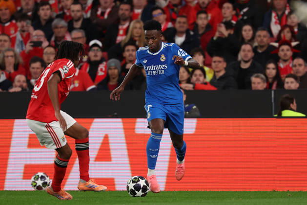 FBL-UEFA Champions League 2025-26 SL Benfica - Real Madrid Leandro Barreiro (S.L.Benfica), Vinicius Junior (Real Madrid) in action, with the ball during UEFA Champions League 2025-26 KO play-offs match between Lisboa e Benfica and Real Madrid at Estadio da Luz on Thursday 17 February 2026 in Lisbon, Portugal Copyright: JoaquimxFerreira