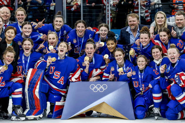 Team USA poses with their gold medals after their overtime win in the Gold Medal Game between Canada and the USA at the Milano Santagiulia Ice hockey, Eishockey Arena in Milan, Italy, on Thursday, February 19, 2026. The USA won the game 2-1 to win the gold medal. Canada wins the Silver and Switzerland won the Bronze medal.  OLY20260219338 AARONxJOSEFCZYK