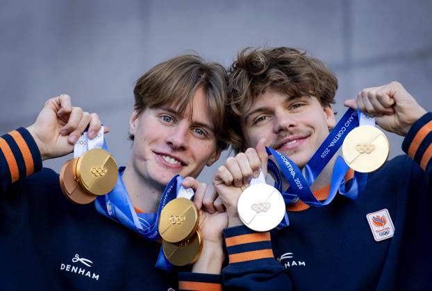 MILAN - A double portrait of brothers Jens (l) and Melle van t Wout with their medals at the Winter Olympics. Short track speed skater Jens van t Wout, with three gold medals and a bronze, is the most successful Dutch male athlete at a single Winter games, Winterspiele,Spiele, Summer games His brother Melle won not only gold in the relay, but also silver in the 500 meters. ROBIN VAN LONKHUIJSEN ANP xVIxANPxSportx xxANPxIVx 551379982 originalFilename: 551379982.jpg