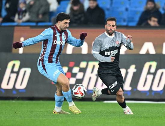 Trabzonspor v Misirli.com.tr Fatih Karagumruk - Turkish Super Lig TRABZON, TURKIYE - FEBRUARY 27: Ozan Tufan (L) of Trabzonspor in action against Filip Mladenovic of Fatih Karagumruk during Turkish Super Lig week 24 football match between Trabzonspor and Misirli.com.tr Fatih Karagumruk at Papara Park in Trabzon, Turkiye on February 27, 2026. Hakan Burak Altunoz Anadolu Trabzon Turkey. Editorial use only. Please get in touch for any other usage. Copyright: x2026xAnadoluxHakanxBurakxAltunozx