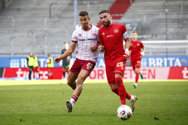 28.02.2026, xavx, Fussball 3.Liga, SV Wehen Wiesbaden - FC Ingolstadt 04 v.l. Marcel Costly (FC Ingolstadt 04), Fatih Kaya (SV Wehen Wiesbaden) (DFL DFB REGULATIONS PROHIBIT ANY USE OF PHOTOGRAPHS as IMAGE SEQUENCES and or QUASI-VIDEO) Wiesbaden