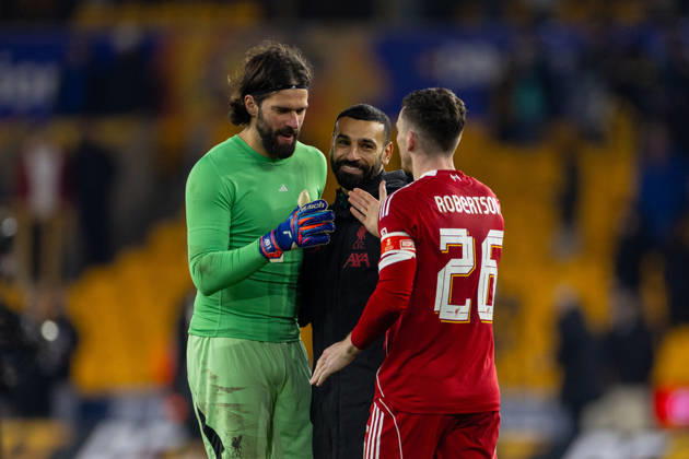 Football - FA Cup - 5th Round - Liverpool FC v Wolverhampton Wanderers FC WOLVERHAMPTON, ENGLAND - Friday, March 6, 2026: Liverpool s (L-R) goalkeeper Alisson Becker celebrate with goalscorers Mohamed Salah and Andy Robertson after the FA Cup 5th Round match between Liverpool FC and Wolverhampton Wanderers FC at Molineux. The game ended 1-3. (Photo by David Rawcliffe Propaganda) WOLVERHAMPTON Molineux WEST MIDLANDS ENGLAND Copyright: xPropagandaxPhotoxAgencyx P2026-03-06-Wolves_Liverpool-130