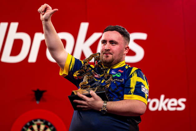 8th March 2026; Butlins Resort, Minehead, Somerset, England; 2026 PDC Ladbrokes UK Open Darts Final Night; Luke Littler celebrates winning the final against James Wade and holds the Ladbrokes UK Open Trophy  GodfreyxPitt