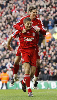 Steven Gerrard of Liverpool celebrates scoring the third goal with Fernando Torres Copyright: x-x