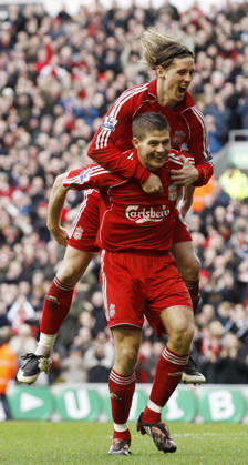 Steven Gerrard of Liverpool celebrates scoring the third goal with Fernando Torres Copyright: x-x