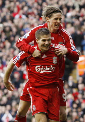 Steven Gerrard of Liverpool celebrates scoring the third goal with Fernando Torres Copyright: x-x