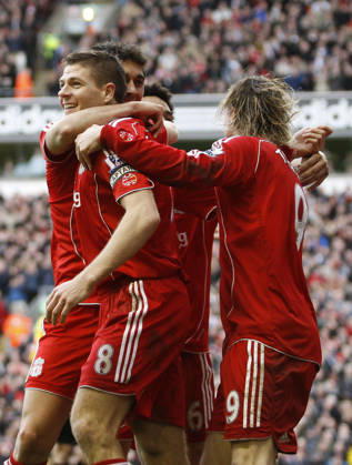 Steven Gerrard of Liverpool celebrates scoring the third goal Copyright: x-x