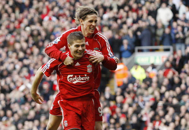 Steven Gerrard of Liverpool celebrates scoring the third goal with Fernando Torres Copyright: x-x