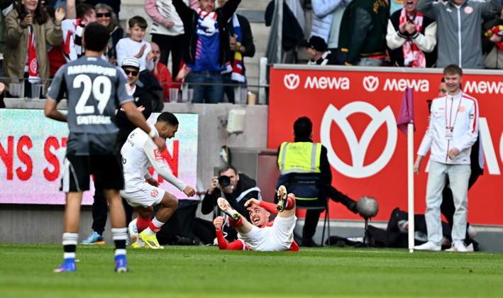22.03.2026, xfux, Fussball 1.Bundesliga, FSV Mainz 05 - Eintracht Frankfurt, v.l. Torschuetze Torschütze Paul Nebel (FSV Mainz 05) Torjubel, Jubel, Goal celebration, celebrate the goal zum 2:1 jubelnd bejubelt jubelt jubeln Jubel (DFL DFB REGULATIONS PROHIBIT ANY USE OF PHOTOGRAPHS as IMAGE SEQUENCES and or QUASI-VIDEO) Mainz