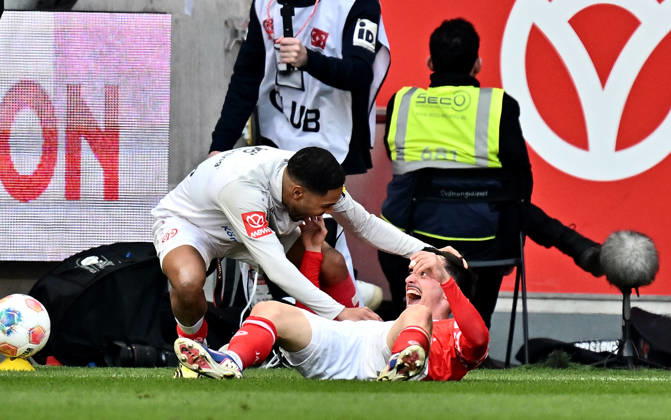 22.03.2026, xfux, Fussball 1.Bundesliga, FSV Mainz 05 - Eintracht Frankfurt, v.l. Torschuetze Torschütze Paul Nebel (FSV Mainz 05) Torjubel, Jubel, Goal celebration, celebrate the goal zum 2:1 jubelnd bejubelt jubelt jubeln Jubel (DFL DFB REGULATIONS PROHIBIT ANY USE OF PHOTOGRAPHS as IMAGE SEQUENCES and or QUASI-VIDEO) Mainz