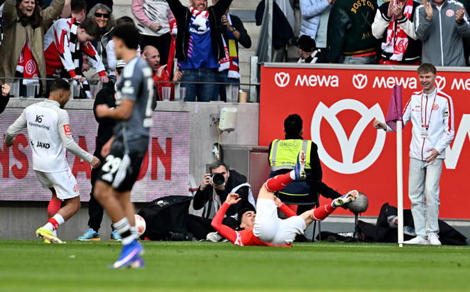 22.03.2026, xfux, Fussball 1.Bundesliga, FSV Mainz 05 - Eintracht Frankfurt, v.l. Torschuetze Torschütze Paul Nebel (FSV Mainz 05) Torjubel, Jubel, Goal celebration, celebrate the goal zum 2:1 jubelnd bejubelt jubelt jubeln Jubel (DFL DFB REGULATIONS PROHIBIT ANY USE OF PHOTOGRAPHS as IMAGE SEQUENCES and or QUASI-VIDEO) Mainz