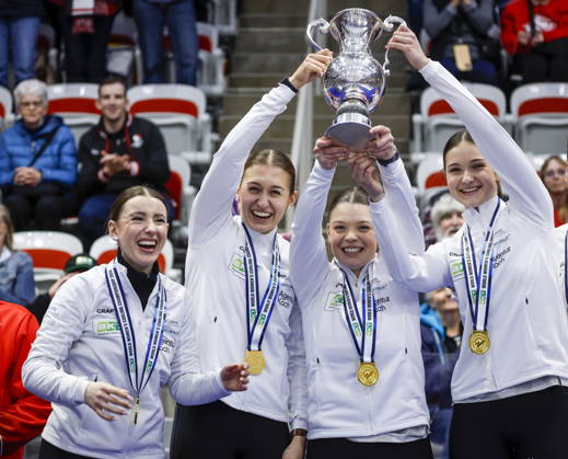 March 22, 2026, Calgary, Ab, CANADA: Switzerland skip Xenia Schwaller, left to right, third Selina Gafner, vice-skip Fabienne Rieder and lead Selina Rychiger raise the trophy after defeating Canada to win the World WomenöÄÃ s Curling Championship in Calgary, Sunday, March 22, 2026. Selina Rychiger, Fabienne Rieder, Selina Gafner, Xenia Schwaller - ZUMAc35_ 20260322_zaf_c35_039 Copyright: xJeffxMcintoshx