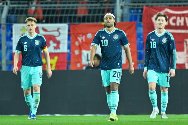 Basel, St.Jakob-Park, 27.03.26, GER, Herren, Laenderspiel: Schweiz - Deutschland Bild: v.li. Joshua KIMMICH (Deutschland), Serge GNABRY (Deutschland), Angelo STILLER (Deutschland) UEFA regulations prohibit any use of photographs as image sequences and or quasi-video. Basel Schweiz