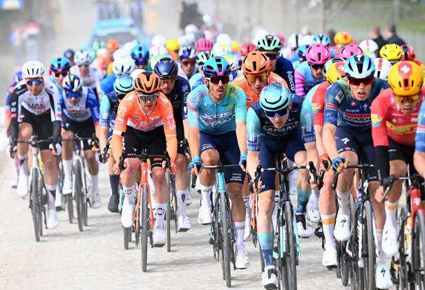 The pack of riders pictured in action during the men elite race of the Dwars Door Vlaanderen cycling event, 184,6km from Roeselare to Waregem, Wednesday 01 April 2026. POOLxTOMASxSISK x169504850x