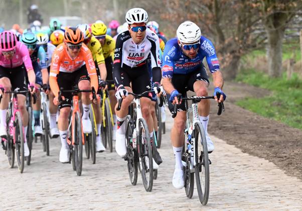 The pack of riders pictured in action during the men elite race of the Dwars Door Vlaanderen cycling event, 184,6km from Roeselare to Waregem, Wednesday 01 April 2026. POOLxTOMASxSISK x169504854x