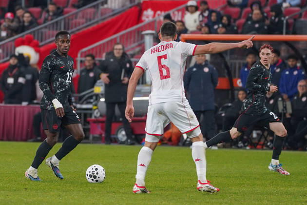 Canada v Tunisia - International Friendly, Länderspiel, Nationalmannschaft Match Richie Laryea 22 of Canada is pressured by Rani Khedira 6 of Tunisia during the International Friendly match between Canada and Tunisia at BMO Filed. on March 31, 2026 in Toronto, Ontario. Toronto Ontario Canada Copyright: xLeonardoxRamirezx