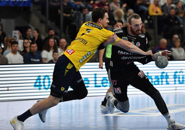 05.04.2026 - Handball - 1. Bundesliga DAIKIN HBL - Saison 2025 2026 - 27. Spieltag: HC Erlangen Metropolregion Nürnberg HCE - Rhein-Neckar Löwen - OGo - xogox - Robert Timmermeister (7, Rhein Neckar Löwen ) Antonio Metzner (27, HC Erlangen HCE )
