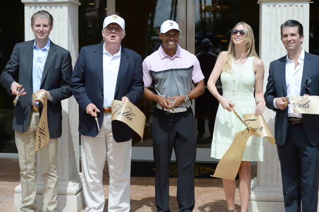DORAL, FL - MARCH 05: Eric Trump, Donald Trump, Tiger Woods, Ivanka Trump and Donald Trump Jr. cut a ribbon in front of the Tiger Woods Villa prior to the start of the World Golf Championships-Cadillac Championship at Trump National Doral on March 5, 2014 in Doral, Florida....People: Eric Trump; Donald Trump; Tiger Woods; Ivanka Trump; Donald Trump Jr. Copyright: xSMGx