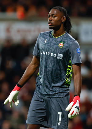 Wrexham, Wales, 7th April 2026. Arthur Okonkwo of Wrexham during the Wrexham vs Southampton Sky Bet Championship match at the SToK Cae Ras, Wrexham. Picture credit should read: Cody Froggatt Sportimage EDITORIAL USE ONLY. No use with unauthorised audio, video, data, fixture lists, club league logos or live services. Online in-match use limited to 120 images, no video emulation. No use in betting, games or single club league player publications. SPI_090_CF_WREXHAM_V_SOUTHAMPTON SPI-4671-0087