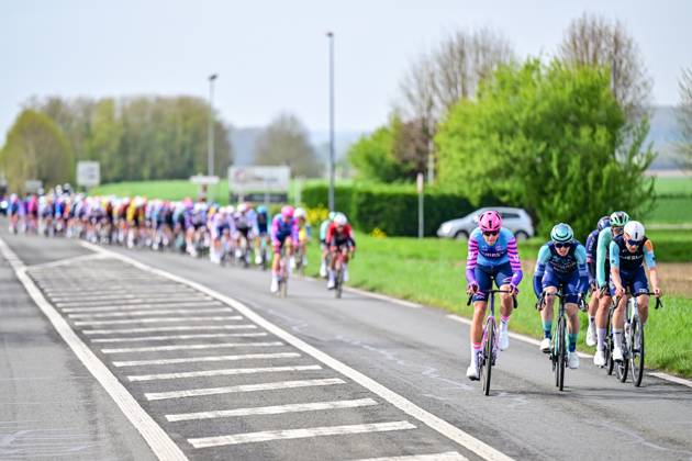 The pack of riders pictured in action during the men s Paris-Roubaix cycling race, Sunday 12 April 2026, around Roubaix, France. The 123rd edition of Paris-Roubaix cycling races will take on Sunday, with the women riding 143,1 km the men riding 258,3 km on Sunday. DIRKxWAEM x170546471x