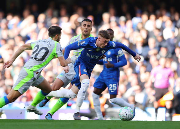 12th April 2026; Stamford Bridge, Chelsea, London, England: Premier League Football, Chelsea versus Manchester City; Cole Palmer of Chelsea under pressure from Bernardo Silva and Rodri of Manchester City JPxFletcher