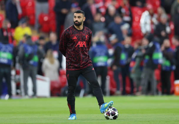 Liverpool, England, 14th April 2026. Mohamed Salah of Liverpool warms up before the Liverpool vs Paris Saint Germain UEFA Champions League quarter final 2nd leg match at Anfield, Liverpool. Picture credit should read: Jessica Hornby Sportimage EDITORIAL USE ONLY. No use with unauthorised audio, video, data, fixture lists, club league logos or live services. Online in-match use limited to 120 images, no video emulation. No use in betting, games or single club league player publications. SPI_026_JH_Liverpool_PSG SPI-4687-0030