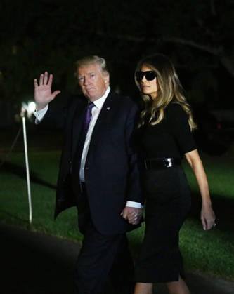 February 12, 2017 - Washington, District of Columbia, United States of America - United States President Donald J. Trump and first lady Melania Trump return to the White House from Las Vegas, Nevada October 4, 2017. The President and the first lady visited with civilian heroes and first responders from the deadliest mass shooting in US history. .Credit: Olivier Douliery Pool via CNP Copyright: xOlivierxDoulieryx