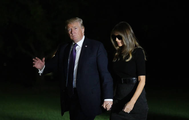 February 12, 2017 - Washington, District of Columbia, United States of America - United States President Donald J. Trump and first lady Melania Trump return to the White House from Las Vegas, Nevada October 4, 2017. The President and the first lady visited with civilian heroes and first responders from the deadliest mass shooting in US history. .Credit: Olivier Douliery Pool via CNP Copyright: xOlivierxDoulieryx