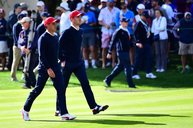 September 30, 2017 - Jersey City, New Jersey, U.S - Rickie Fowler of the US Team(left) and Justin Thomas of the US Team(right) approach the 12th hole during Saturday matches of the Presidents Cup at Liberty National Golf Club in Jersey City, NJ Copyright: xBrianxCianciox