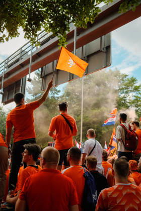 10.07.24, Football, UEFA EURO, EM, Europameisterschaft,Fussball 2024, Netherlands Fan March Netherlands fans in orange shirts wave Dutch flags and an orange lion flag amid smoke during the fan march in Dortmund, Germany, before the UEFA Euro 2024 semi-final between the Netherlands and England. Dortmund Dortmund NRW Germany