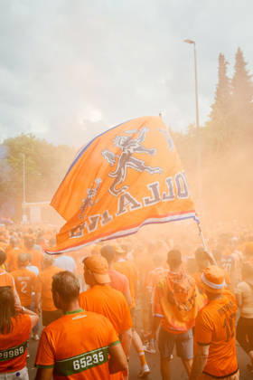 10.07.24, Football, UEFA EURO, EM, Europameisterschaft,Fussball 2024, Netherlands Fan March A large orange Holland flag waves above a dense crowd of Netherlands fans in orange smoke during the fan march in Dortmund, Germany, before the UEFA Euro 2024 semi-final match against England. Dortmund Dortmund NRW Germany