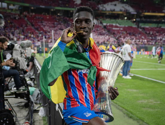 . - Crystal Palace v Rayo Vallecano, UEFA Conference League Final 2026, Red Bull Arena, Leipzig, Germany, 27th May 2026. Daniel Weir Crystal Pix Ismaila Sarr of Crystal Palace biting his UEFA Conference League 2026 Winners Medal and holding the Conference League Trophy. - Crystal Palace v Rayo Vallecano, UEFA Conference League Final 2026, Red Bull Arena, Leipzig, Germany, 27th May 2026. Daniel Weir Crystal Pix Leipzig Red Bull Arena Germany Copyright: xDanielxWeirx CP_Crystal_Palace_Rayo_Vallecano_270526_DW05