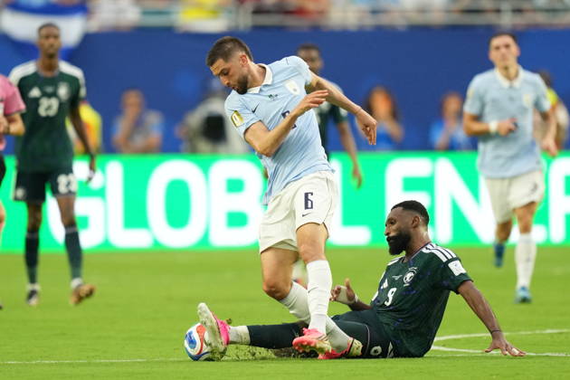 Saudi Arabia v Uruguay - FIFA World Cup, WM, Weltmeisterschaft, Fussball 2026 - Group H FLORIDA, USA - JUNE 15: Firas Al-Buraikan (9) of Saudi Arabia in action against Rodrigo Bentancur (6) of Uruguay during the 2026 FIFA World Cup First Stage Group H match between Saudi Arabia and Uruguay at Hard Rock Stadium (Miami Stadium) in Miami Gardens, Florida, United States on June 15, 2026. Evrim Aydin Anadolu Florida United States. Editorial use only. Please get in touch for any other usage.  Copyright: x2026xAnadoluxEvrimxAydinx