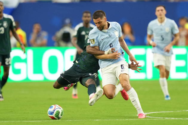 Saudi Arabia v Uruguay - FIFA World Cup, WM, Weltmeisterschaft, Fussball 2026 - Group H FLORIDA, USA - JUNE 15: Firas Al-Buraikan (9) of Saudi Arabia in action against Rodrigo Bentancur (6) of Uruguay during the 2026 FIFA World Cup First Stage Group H match between Saudi Arabia and Uruguay at Hard Rock Stadium (Miami Stadium) in Miami Gardens, Florida, United States on June 15, 2026. Evrim Aydin Anadolu Florida United States. Editorial use only. Please get in touch for any other usage.  Copyright: x2026xAnadoluxEvrimxAydinx