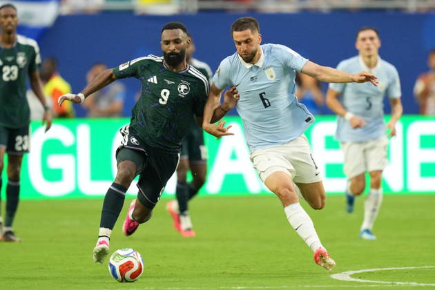 Saudi Arabia v Uruguay - FIFA World Cup, WM, Weltmeisterschaft, Fussball 2026 - Group H FLORIDA, USA - JUNE 15: Firas Al-Buraikan (9) of Saudi Arabia in action against Rodrigo Bentancur (6) of Uruguay during the 2026 FIFA World Cup First Stage Group H match between Saudi Arabia and Uruguay at Hard Rock Stadium (Miami Stadium) in Miami Gardens, Florida, United States on June 15, 2026. Evrim Aydin Anadolu Florida United States. Editorial use only. Please get in touch for any other usage.  Copyright: x2026xAnadoluxEvrimxAydinx