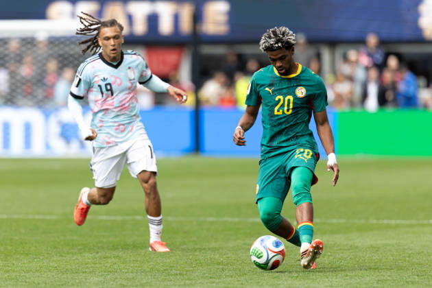 July 1, 2026, Seattle, Washington, USA: Senegal forward Ibrahim Mbaye (20) runs with ball by Belgium midfielder Diego Moreira (19) in overtime of the game Belgium national team, Nationalteam vs Senegal National Team for the FIFA World Cup, WM, Weltmeisterschaft, Fussball match, at Seattle Stadium. Seattle USA - ZUMAl181 20260701_zsp_l181_102 Copyright: xMelissaxLevinx