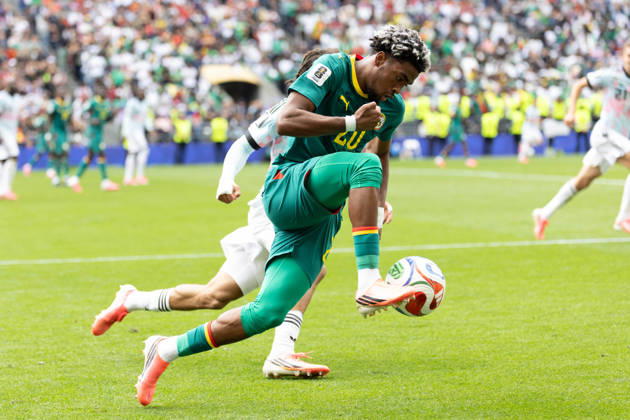 July 1, 2026, Seattle, Washington, USA: Senegal forward Ibrahim Mbaye (20) takes the ball by Belgium midfielder Diego Moreira (19) in overtime of the game Belgium national team, Nationalteam vs Senegal National Team for the FIFA World Cup, WM, Weltmeisterschaft, Fussball match, at Seattle Stadium. Seattle USA - ZUMAl181 20260701_zsp_l181_196 Copyright: xMelissaxLevinx