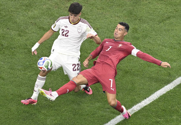 (260707) -- DALLAS, July 7, 2026 -- Cristiano Ronaldo (R) of Portugal vies with Pau Cubarsi of Spain during the round of 16 match between Spain and Portugal at the 2026 FIFA World Cup, WM, Weltmeisterschaft, Fussball at Dallas Stadium in Dallas, the United States, July 6, 2026. ) (SP)U.S.-DALLAS-FOOTBALL-FIFA WORLD CUP-ROUND OF 16-ESP VS POR ChengxMin 