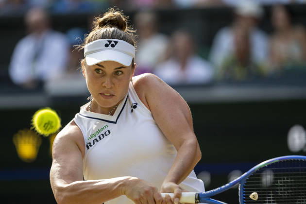 (260710) -- LONDON, July 10, 2026 -- Linda Noskova of the Czech Republic hits a return during the women s semifinal match against Marta Kostyuk of Ukraine at the Wimbledon Tennis Championships in London, Britain, on July 9, 2026. (Photo by Xinhua) (SP)BRITAIN-LONDON-TENNIS-WIMBLEDON-WOMEN S SINGLES StephenxChung 
