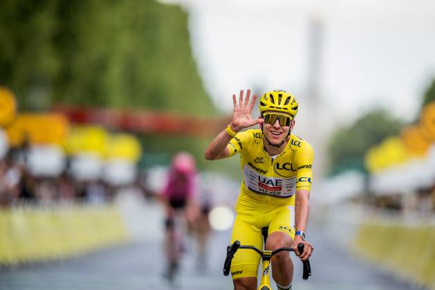 Slovenian Tadej Pogacar of UAE Team Emirates-XRG celebrates as he crosses the finish line at stage 21 of the 2026 Tour de France cycling race, a stage of 130km from Thoiry to Paris Champs-Elysees , on Sunday 26 July 2026. The 113th edition of the Tour de France starts on Saturday 4 July in Barcelona, Spain, and will finish in Paris, France on the 26th of July. JASPERxJACOBS  x182145232x